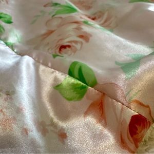 I’m selling a medium silk robe with rose pattern